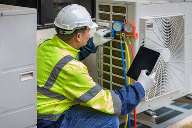Professional Hvac technician working in Longmire, WA
